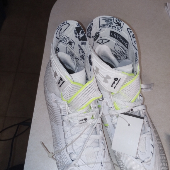 Under Armour cleats. - Picture 10 of 11